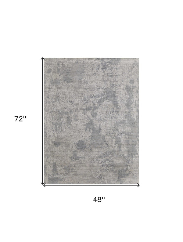 HomeRoots 3' Hand Woven Gray and Ivory Abstract Area Rug – Artisan Crafted for Modern Homes and Cozy Spaces 4' X 6' 566861