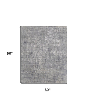 HomeRoots 3' Gray and Silver Abstract Area Rug - Hand-Woven, Contemporary Design for Modern Living Spaces 5' X 8' 566877