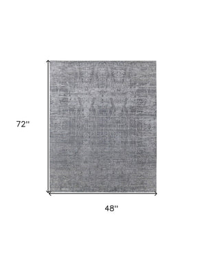 HomeRoots 3' Gray and Silver Abstract Hand-Woven Area Rug - Contemporary Elegance for Your Living Space 4' X 6' 566884