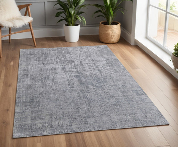 HomeRoots 3' Light Blue and Silver Abstract Area Rug - Hand-Woven Artistry for Modern Home Elegance 4' X 6' 566899