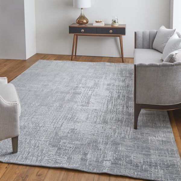 HomeRoots 3' Light Blue and Silver Abstract Area Rug - Hand-Woven Artistry for Modern Home Elegance 2' X 3' 566904