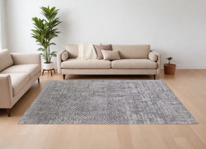 HomeRoots 3' Gray and Silver Abstract Hand-Woven Area Rug - Artisanal Craftsmanship for Modern Spaces 8' X 10' 566908