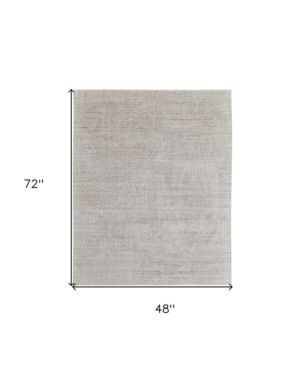 HomeRoots 3' Elegant Hand-Woven Ivory and Gray Abstract Area Rug for Transitional and Bohemian Spaces 4' X 6' 566914