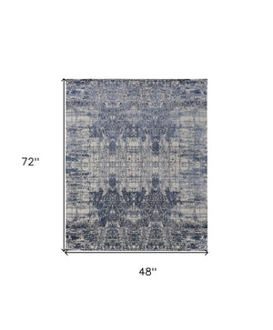 HomeRoots 3' Blue and Ivory Abstract Hand-Woven Area Rug – Artisanal Charm for Modern Coastal Interiors 4' X 6' 566930