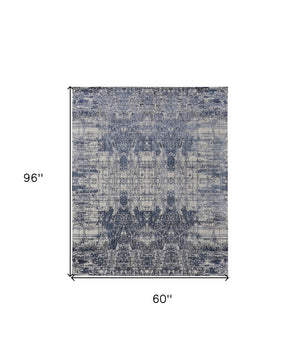 HomeRoots 3' Blue and Ivory Abstract Hand-Woven Area Rug – Artisanal Charm for Modern Coastal Interiors 5' X 8' 566931