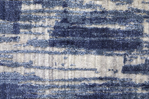HomeRoots 3' Blue and Ivory Abstract Hand-Woven Area Rug - Artisan Crafted for Modern Elegance and Comfort 9' X 12' 566941