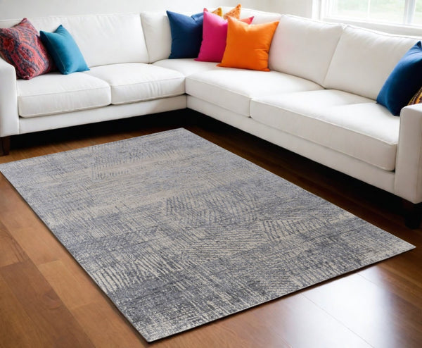 HomeRoots 3' Hand Woven Abstract Area Rug in Gray, Ivory & Blue - Timeless Texture for Modern & Traditional Spaces 5' X 8' 566954