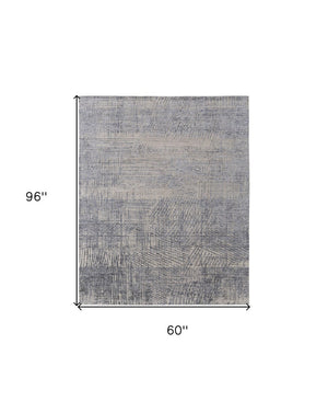 HomeRoots 3' Hand Woven Abstract Area Rug in Gray, Ivory & Blue - Timeless Texture for Modern & Traditional Spaces 5' X 8' 566954