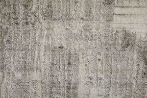 HomeRoots 3' Gray and Ivory Abstract Hand-Woven Area Rug - Artisan Crafted Elegance for Modern Interiors 3' X 5' 566960