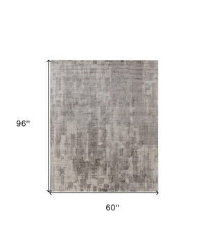 HomeRoots 3' Gray and Ivory Abstract Hand-Woven Area Rug - Artisan Crafted Elegance for Modern Interiors 5' X 8' 566962