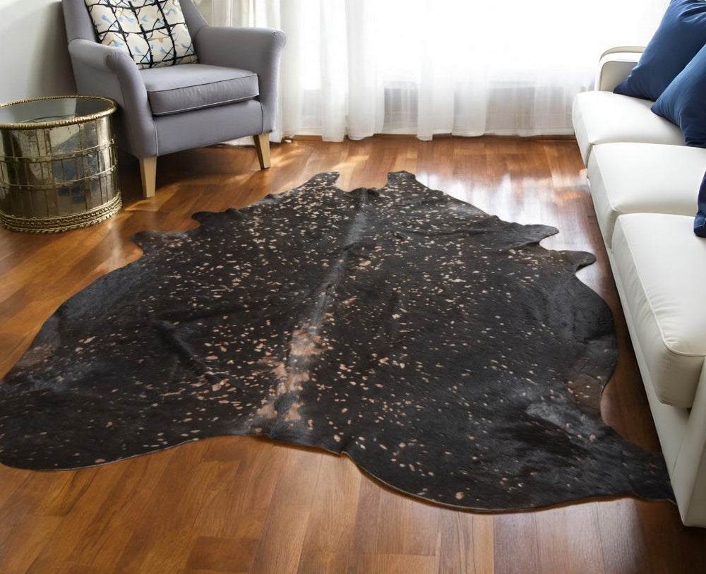 Homeroots 8' X 10' Brown And Tan Cowhide Animal Print Power Loom Area Rug Brown Cowhide 566998