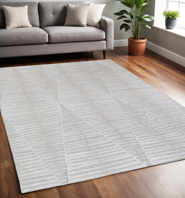 HomeRoots 4' Hand Woven Ivory and Tan Geometric Area Rug - Bohemian Charm for Warm, Inviting Spaces 5' X 8' 567001