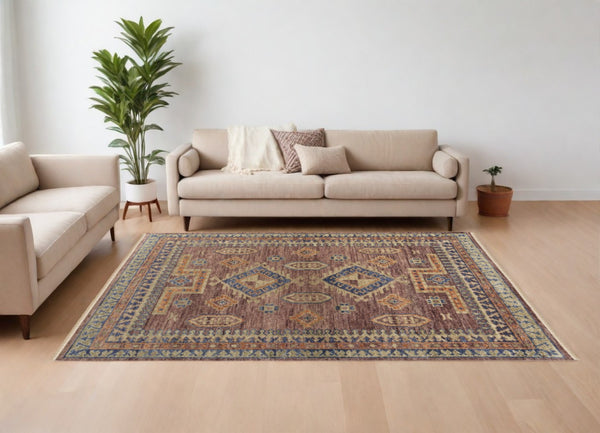 HomeRoots 3' Hand-Knotted Wool Area Rug in Blue, Red, and Tan Geometric Design with Tasseled Fringe Charm 9' X 12' 567031