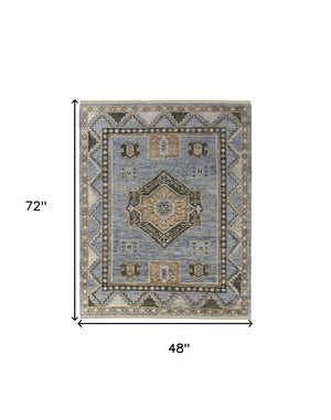 HomeRoots 3' Hand-Knotted Wool Oriental Area Rug in Ivory Tan and Blue – Elegant, Stain-Resistant Design 4' X 6' 567040