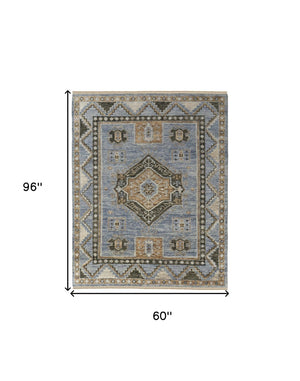 HomeRoots 3' Hand-Knotted Wool Oriental Area Rug in Ivory Tan and Blue – Elegant, Stain-Resistant Design 5' X 8' 567041