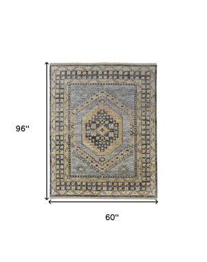 Homeroots 5' X 8' Blue Gray And Tan Wool Oriental Hand Knotted Area Rug With Fringe Blue Wool 567052