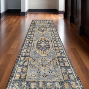 Homeroots 10' Blue Gray And Tan Wool Oriental Hand Knotted Runner Rug With Fringe Blue Wool 567056