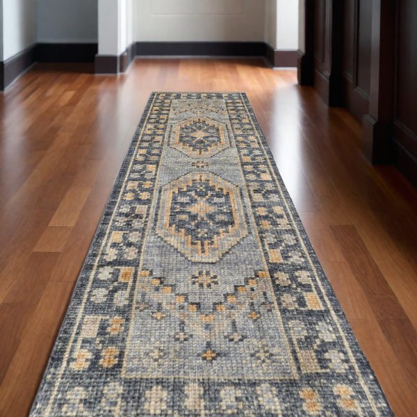 Homeroots 10' Blue Gray And Tan Wool Oriental Hand Knotted Runner Rug With Fringe Blue Wool 567056
