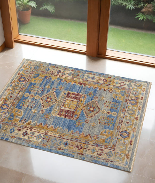 Homeroots 3' X 5' Blue Red And Yellow Wool Geometric Hand Knotted Area Rug With Fringe Blue Wool 567083