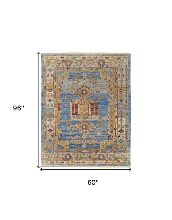 HomeRoots 3' Hand-Knotted Wool Area Rug with Geometric Blue, Red, and Yellow Design for Stylish Interiors 5' X 8' 567085