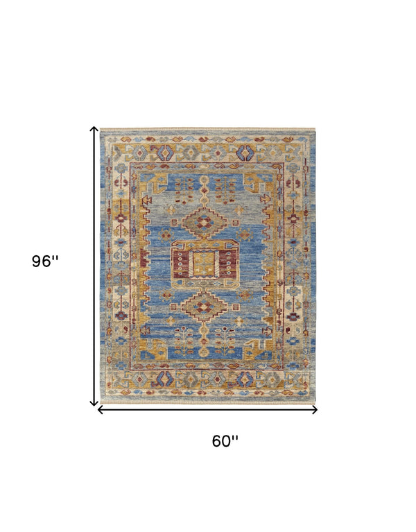 Homeroots 5' X 8' Blue Red And Yellow Wool Geometric Hand Knotted Area Rug With Fringe Blue Wool 567085