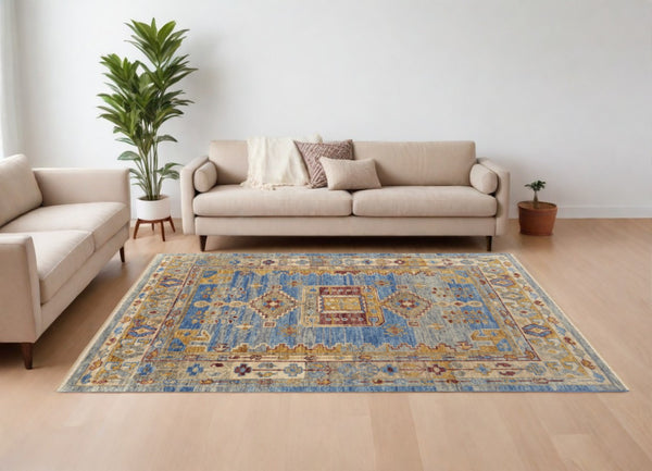 HomeRoots 3' Hand-Knotted Wool Area Rug with Geometric Blue, Red, and Yellow Design for Stylish Interiors 10' X 14' 567088