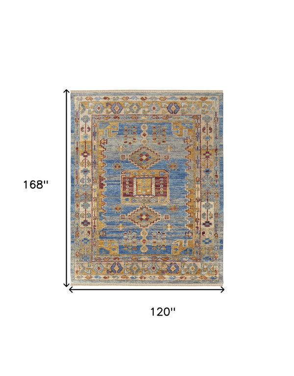 Homeroots 10' X 14' Blue Red And Yellow Wool Geometric Hand Knotted Area Rug With Fringe Blue Wool 567088