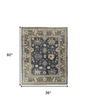 HomeRoots 3' Hand-Knotted Blue and Gray Floral Wool Area Rug with Fringe - Timeless Charm for Any Room 3' X 5' 567095