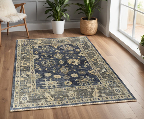 HomeRoots 3' Hand-Knotted Blue and Gray Floral Wool Area Rug with Fringe - Timeless Charm for Any Room 4' X 6' 567096