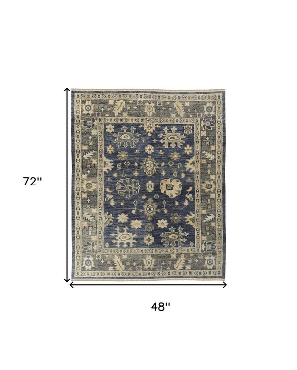 HomeRoots 3' Hand-Knotted Blue and Gray Floral Wool Area Rug with Fringe - Timeless Charm for Any Room 4' X 6' 567096