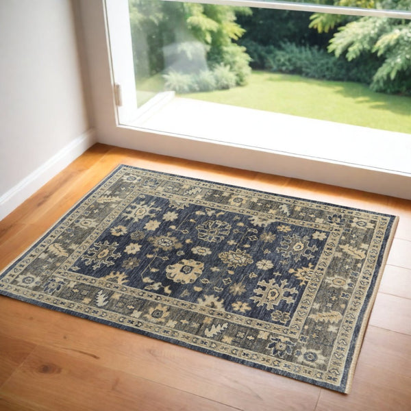 HomeRoots 3' Hand-Knotted Blue and Gray Floral Wool Area Rug with Fringe - Timeless Charm for Any Room 2' X 3' 567106