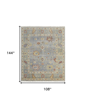 HomeRoots 3' Hand-Knotted Blue and Gray Floral Wool Area Rug with Fringe - Timeless Charm for Any Room 9' X 12' 567111