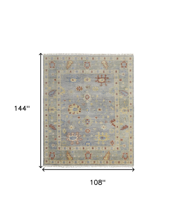 HomeRoots 3' Hand-Knotted Blue and Gray Floral Wool Area Rug with Fringe - Timeless Charm for Any Room 9' X 12' 567111