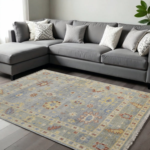 HomeRoots 3' Hand-Knotted Blue and Gray Floral Wool Area Rug with Fringe - Timeless Charm for Any Room 10' X 14' 567112