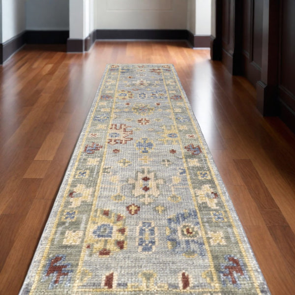 HomeRoots 3' Hand-Knotted Blue and Gray Floral Wool Area Rug with Fringe - Timeless Charm for Any Room 10' Runner 567113