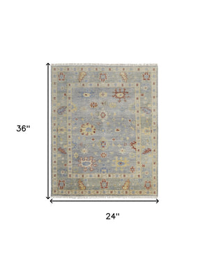 HomeRoots 3' Hand-Knotted Blue and Gray Floral Wool Area Rug with Fringe - Timeless Charm for Any Room 2' X 3' 567115