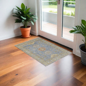 HomeRoots 3' Stylish Hand-Knotted Wool Area Rug with Geometric Design in Green, Blue, Yellow & Fringe 3' X 5' 567116