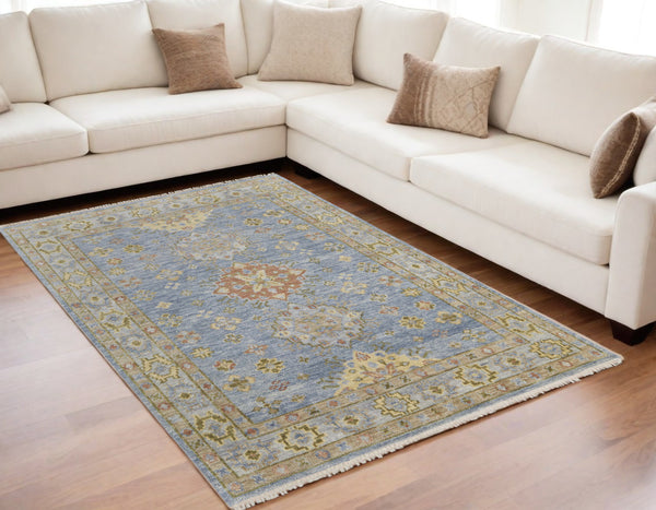 Homeroots 5' X 8' Green Blue And Yellow Wool Geometric Hand Knotted Area Rug With Fringe Blue Wool 567117