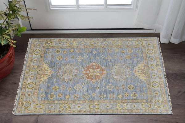 HomeRoots 3' Stylish Hand-Knotted Wool Area Rug with Geometric Design in Green, Blue, Yellow & Fringe 2' X 3' 567120