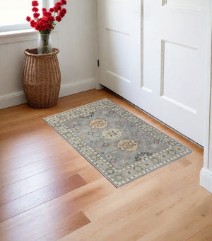 HomeRoots 3' Stylish Hand-Knotted Wool Area Rug with Geometric Design in Green, Blue, Yellow & Fringe 3' X 5' 567121