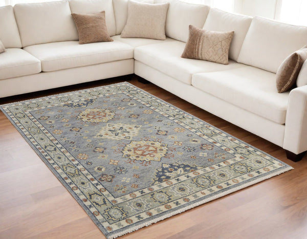 Homeroots 5' X 8' Gray Blue And Taupe Wool Geometric Hand Knotted Area Rug With Fringe Blue Wool 567123