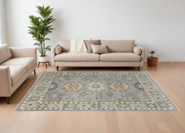 HomeRoots 3' Stylish Hand-Knotted Wool Area Rug with Geometric Design in Green, Blue, Yellow & Fringe 12' X 15' 567129