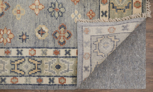 HomeRoots 3' Stylish Hand-Knotted Wool Area Rug with Geometric Design in Green, Blue, Yellow & Fringe 2' X 3' 567130
