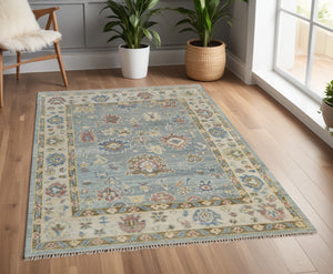 Homeroots 4' X 6' Blue Ivory And Yellow Wool Floral Hand Knotted Area Rug With Fringe Blue Wool 567131