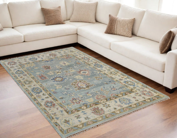 Homeroots 5' X 8' Blue Ivory And Yellow Wool Floral Hand Knotted Area Rug With Fringe Blue Wool 567132