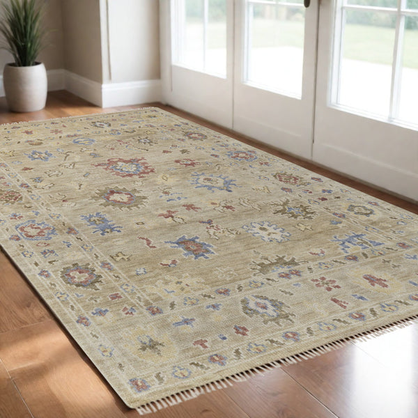 Homeroots 3' X 5' Tan Brown And Blue Wool Floral Hand Knotted Area Rug With Fringe Brown Wool 567136