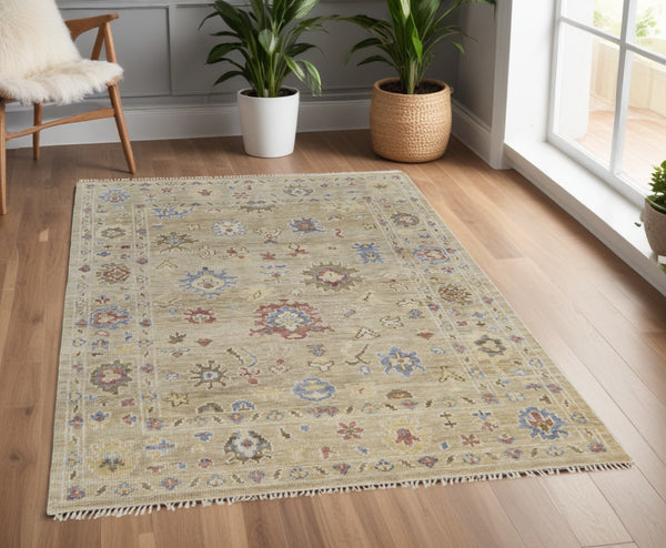 Homeroots 4' X 6' Tan Brown And Blue Wool Floral Hand Knotted Area Rug With Fringe Brown Wool 567137
