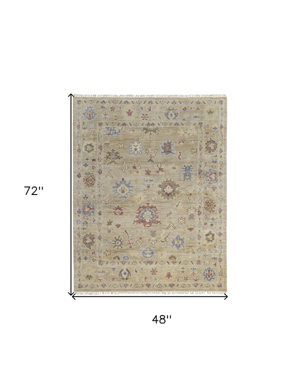 Homeroots 4' X 6' Tan Brown And Blue Wool Floral Hand Knotted Area Rug With Fringe Brown Wool 567137