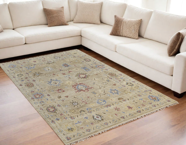 Homeroots 5' X 8' Tan Brown And Blue Wool Floral Hand Knotted Area Rug With Fringe Brown Wool 567138