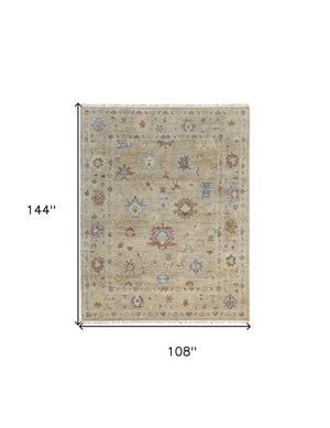 Homeroots 9' X 12' Tan Brown And Blue Wool Floral Hand Knotted Area Rug With Fringe Brown Wool 567140